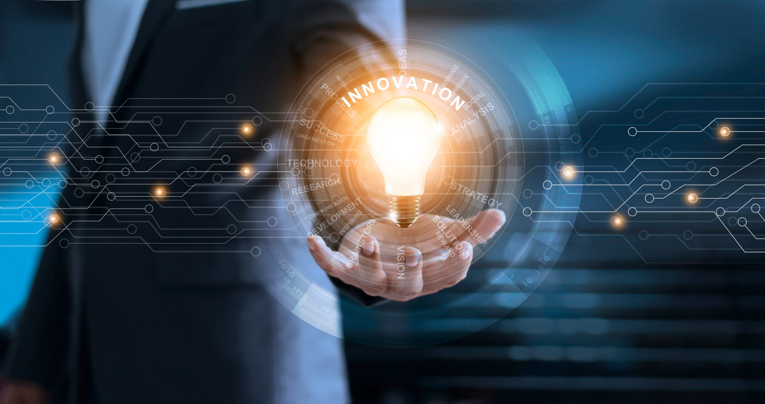 Innovation and technology concept. Businessman holding light bul